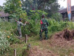 Jelang HUT TNI, Koramil 04/Badau Bersama Satgas Pamtas RI-Malaysia Gelar Karya Bakti di TMP Dwi Kora